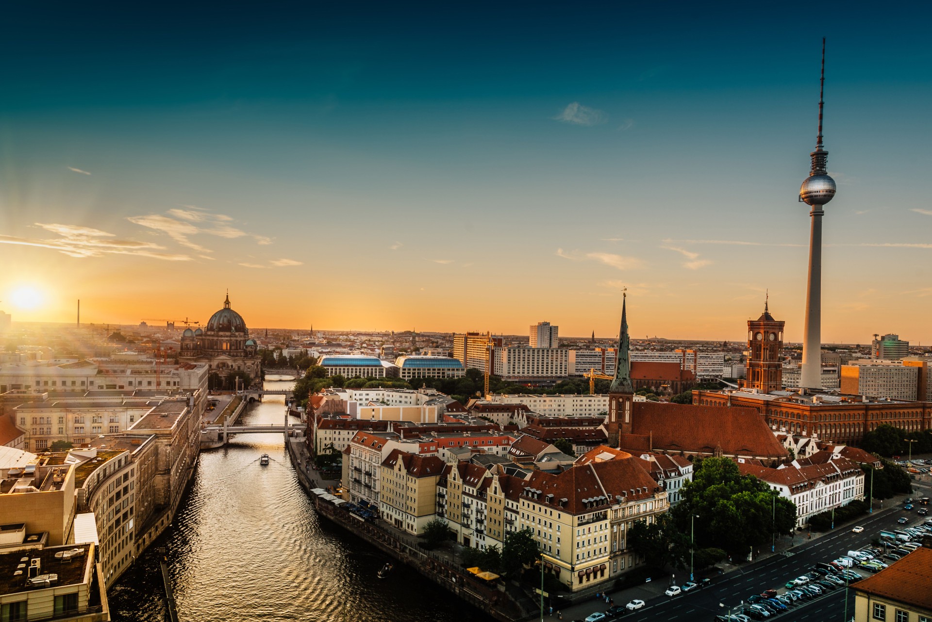 sunset over berlin with television tower and berlin cathedral