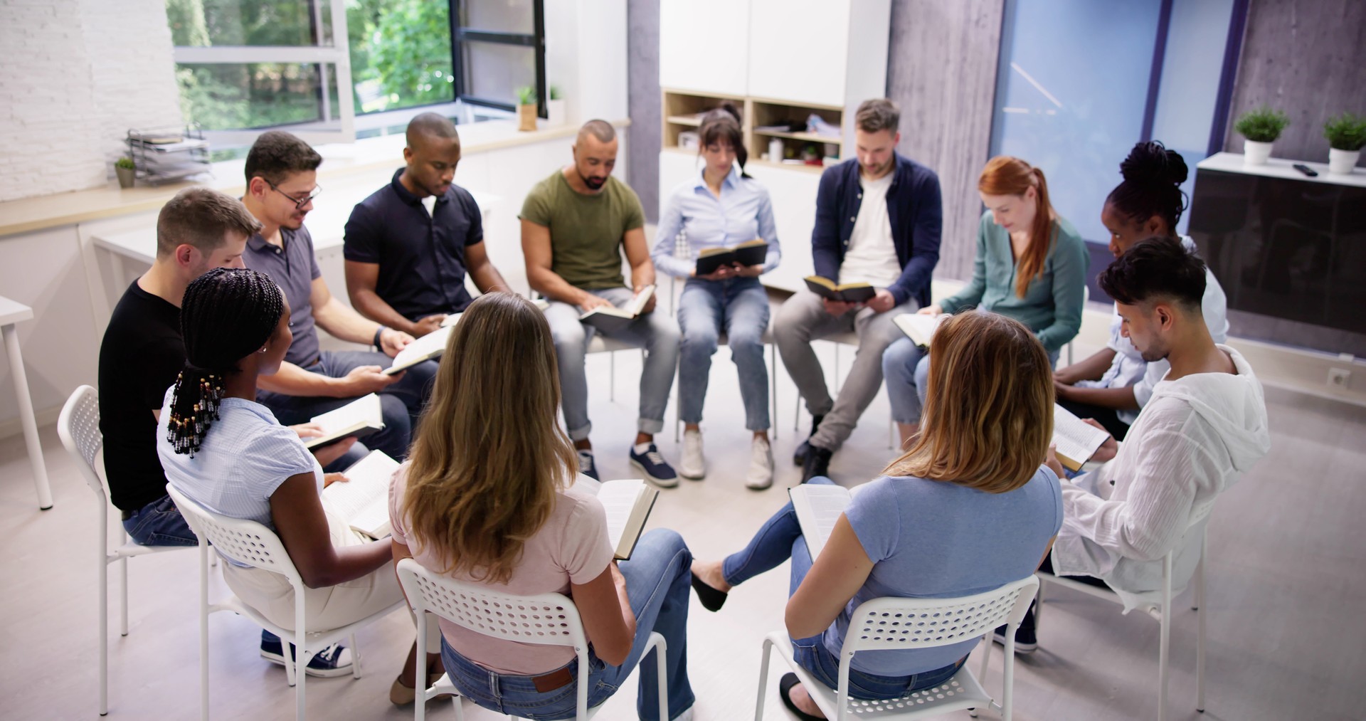 Diverse Group Reading And Studying Bible